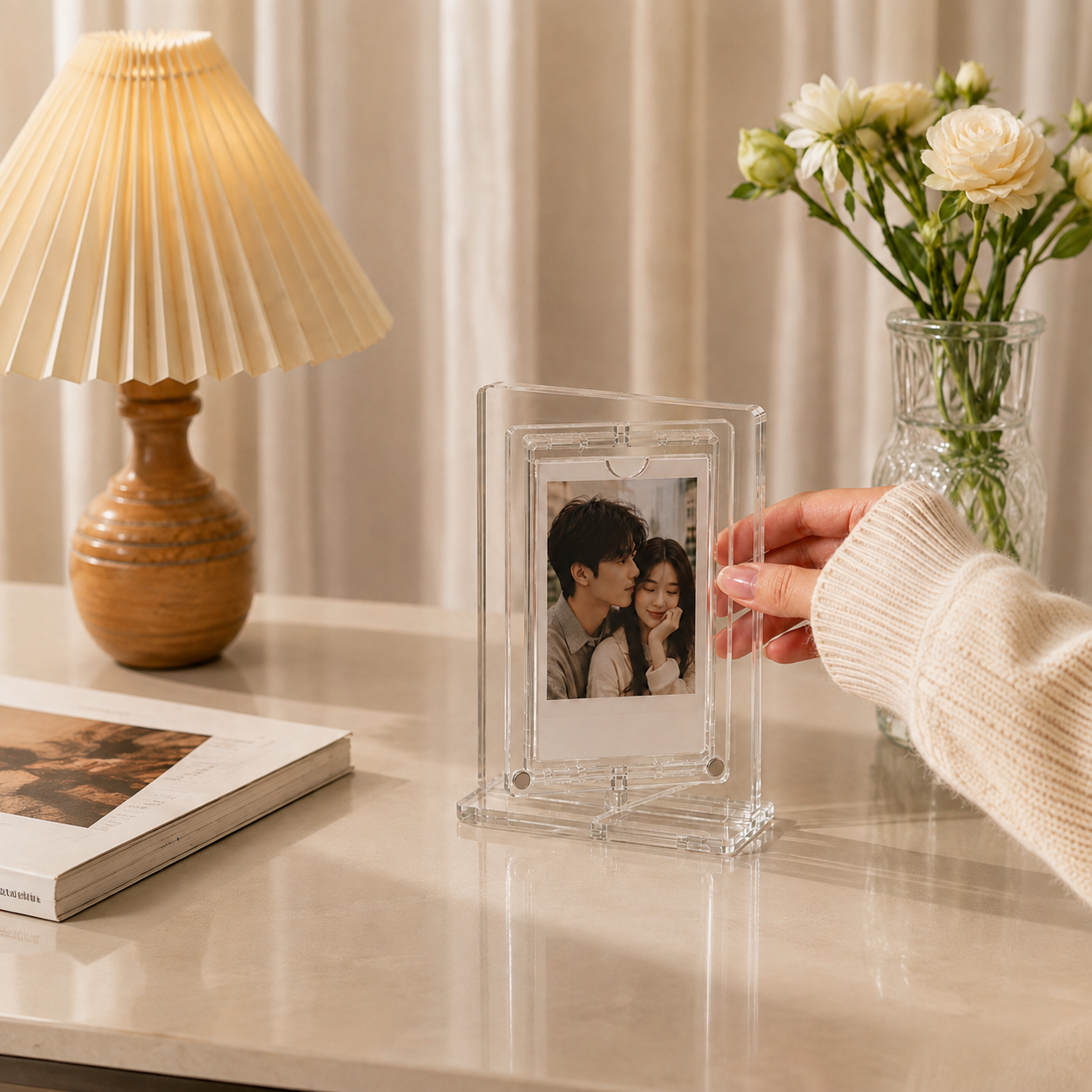 Rotating acrylic photo frame displayed on a desk